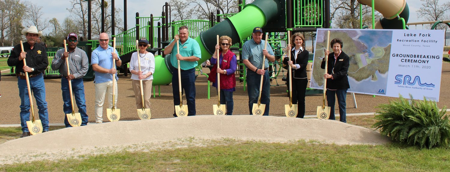 Officials at the Lake Fork Recreation Facility groundbreaking March 11, from left, Wood County Sheriff Tom Castloo; SRA Board Members Jeff Jacobs, Kevin Williams, Janie Walenta, Tom Beall, Laurie Woloszyn and Mac Abney; Wood County Judge Lucy Hebron and SRA Board President Jeanette Sterner.